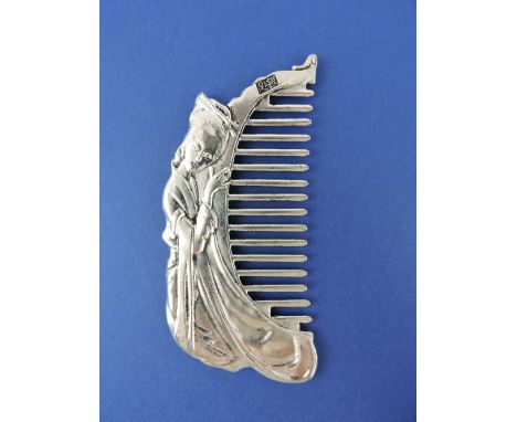 A Chinese plated or white metal comb cast with a reclining Geisha, bears character mark, L. 10 cm.