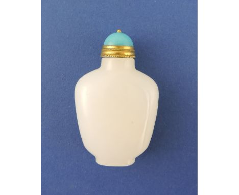 A white jade scent bottle, with a turquoise stone stopper, H. 6cm.