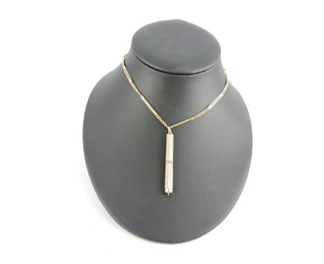 A 9ct yellow gold cigar piercer with engine turned twist action barrel case on a 9ct elongated link chain, total 12 gr (gross