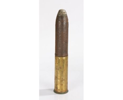 First World War German 77mm projectile, shell case and fuze, base of case dated May 1917, inert