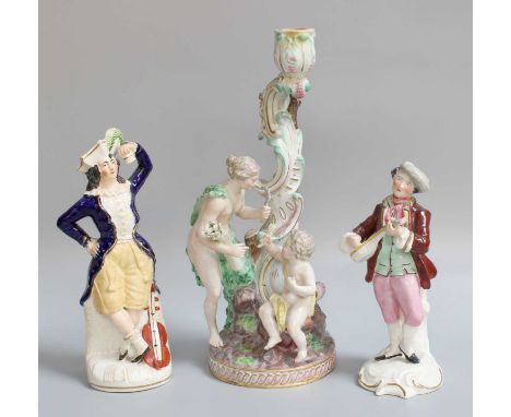 A Meissen Porcelain Figural Candlestick, late 19th century, emblematic of summer, 28cm; together with two Staffordshire figur