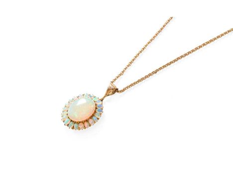 An Opal Cluster Pendant on Chain, the oval cabochon opal within a border of smaller oval cabochon opals, in yellow claw setti