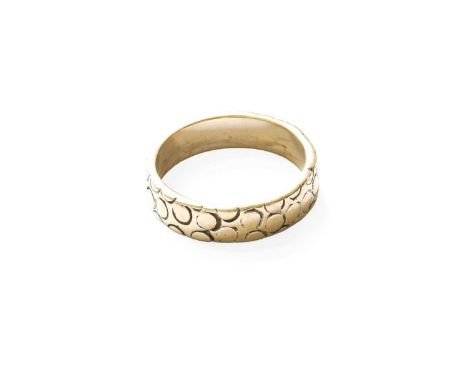 An 18 Carat White Gold Textured Band Ring, finger size P1/2Gross weight 6.7 grams.