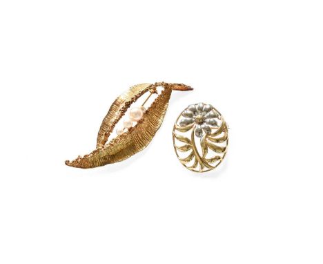 A 9 Carat Gold Cultured Pearl Brooch, four graduated cultured pearls within a yellow textured leaf motif frame, measures 6.3c