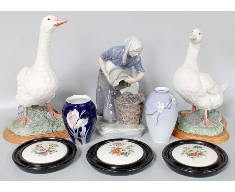 A Royal Copenhagen Porcelain Figure, 'Potato Woman' model no. 1549, together with two similar vases, prattware pot lids and t