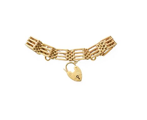 A Gate Link Bracelet, stamped '9' and '375', with a 9 carat gold heart shaped padlock clasp, length 18cmGross weight 35.4 gra