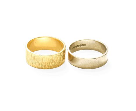 A 9 Carat Gold Textured Band Ring, finger size O1/2; and A 9 Carat White Gold Band Ring, finger size P1/2Gross weight 8.6 gra