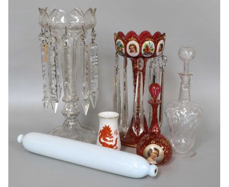 A 19th Century Bohemian Cranberry Glass Table Lustre, decorated with portrait medallions, 29cm high, a similar bottle with st