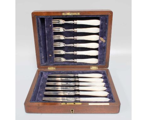 A Cased Set of Edward VII Silver and Mother-of-Pearl Fruit-Eaters, by Henry Wigfull, Sheffield, 1908, each with tapering and 