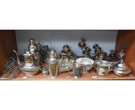 A Collection of Assorted Silver Plate, including two cocktail shakers, one with revolving recipes; various candle-branches; a