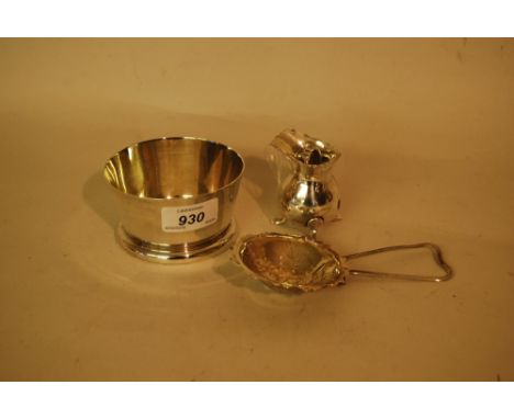 A.E. Jones, Birmingham silver sugar basin together with a small silver cream jug (a/f) and a silver tea strainer (a/f)
