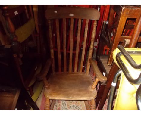 Stick back open arm rocking chair together with another 20th Century armchair with pierced back