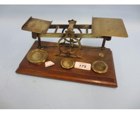 S. Mordan and Co., pair of 19th Century brass and oak postal scales with weights