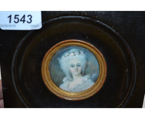 Circular mounted miniature head and shoulder portrait on ivorine of a lady, signed Pastora, ebonised framed