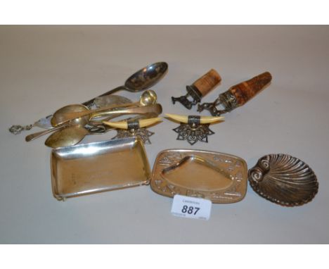 Three silver trinket dishes, pair of silver mounted ivory knife rests, two bottle stoppers, various small spoons, butter knif