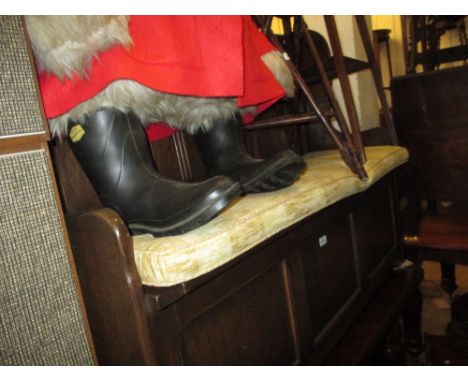 20th Century oak hall bench having arch panelled and carved back support with loose cushion and box seat with hinged cover