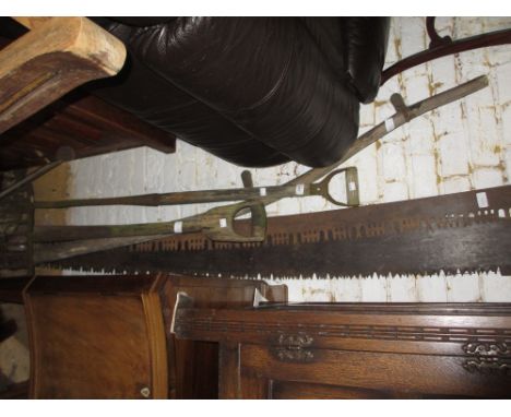 Quantity of various tools including three pit saws, hay fork etc