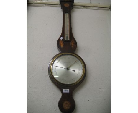 19th Century mahogany boxwood, line and shell inlaid wheel barometer / thermometer, the silvered dial inscribed F. Pastorelli