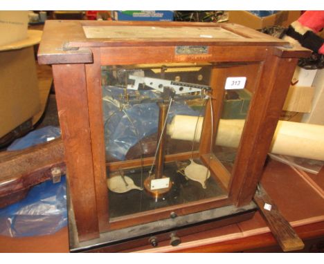 Mid 20th Century scientific balance scale in a four glass case