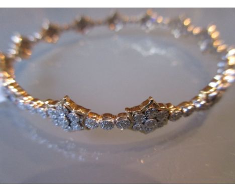 18ct Yellow and white gold multi flower head cluster diamond set bangle