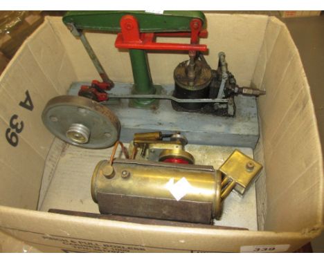 Steam driven stationary engine together with another similar
