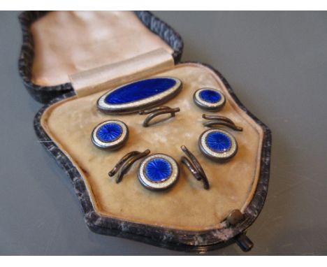Silver mounted blue and white translucent enamel stud set in a fitted case