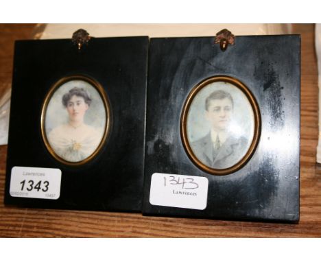 Pair of watercolour portrait miniatures of a lady and gentleman, framed