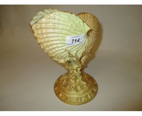 Royal Worcester blush ivory and gilt decorated vase in the form of a shell on circular naturalistic base