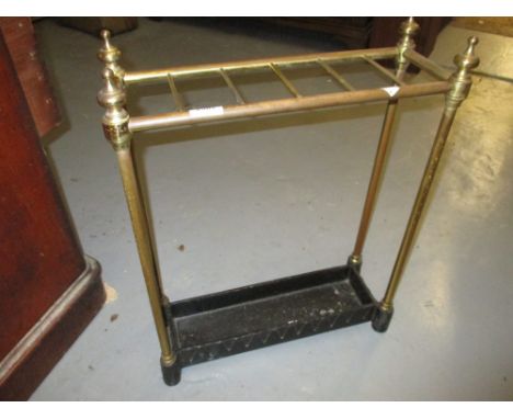 Early 20th Century brass six division stick stand with iron drip tray