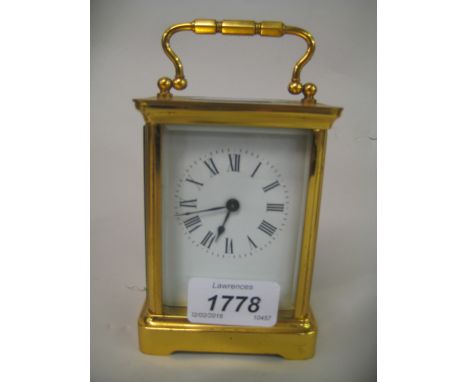 Small brass cased carriage clock with single train movement