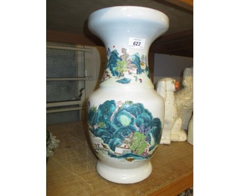 Chinese famille vert baluster form vase decorated with a river landscape (chip to rim)