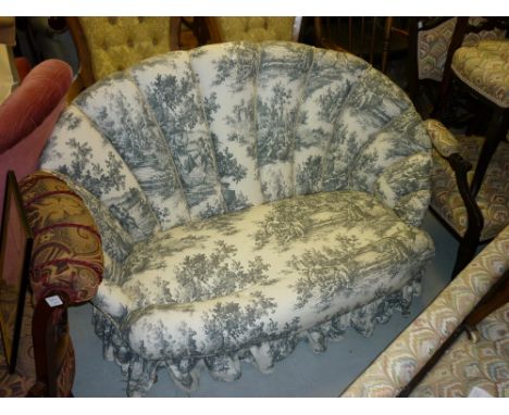 Victorian shell back sofa recently re-upholstered in black and white toile de jouy on turned supports