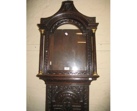 Antique oak longcase clock case with later carved decoration