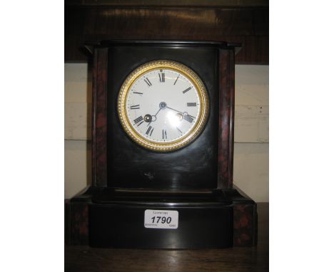 19th Century black slate and rouge flecked marble mantel clock, the enamel dial with Roman numerals and two train movement
