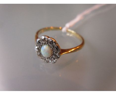 Yellow gold, opal and diamond cluster ring