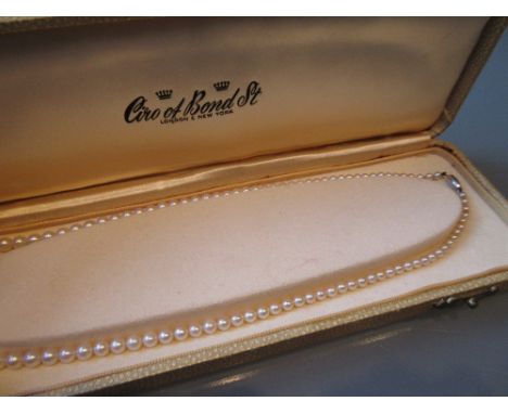 Single row graduated cultured pearl necklace by Ciro with a 9ct gold white gold clasp and original fitted case