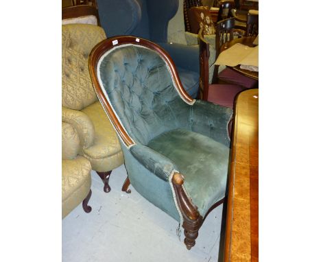 Victorian button upholstered tub shaped drawing room armchair on mahogany turned supports