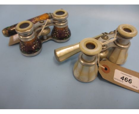 Pair of enamel cased opera glasses, together with a pair of mother of pearl cased opera glasses