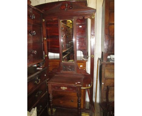 Late 19th Century walnut hall stand having mirrored back with brass hooks above two stick stands and central single drawer wi