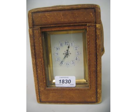 French gilt brass cased carriage clock, the enamel dial with Arabic numerals, the twin train movement with hour repeat functi