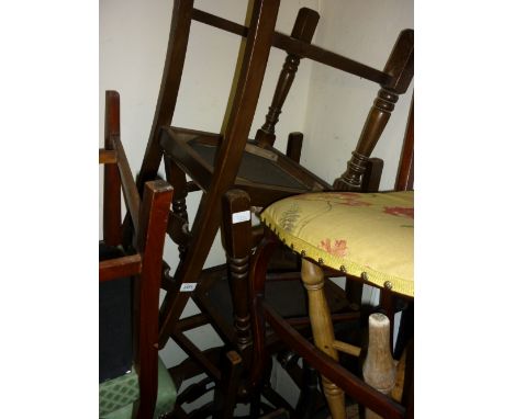 Set of six (four plus two) oak ladder back dining chairs on turned supports