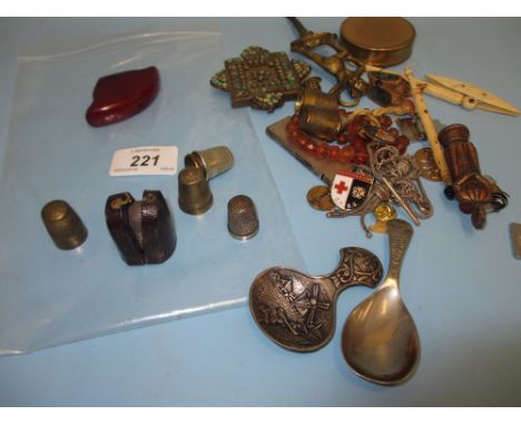 Silver leather cased thimble, quantity of other brass and plated thimbles, two caddy spoons, corkscrew and miscellaneous othe
