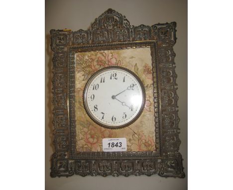 Victorian brass and pottery easel clock with enamel dial, Arabic numerals, floral decoration and pierced frame