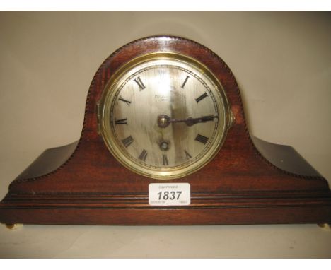 Mahogany barbers pole and line inlaid dome top mantel clock, having circular silvered dial with Roman numerals, inscribed J.W