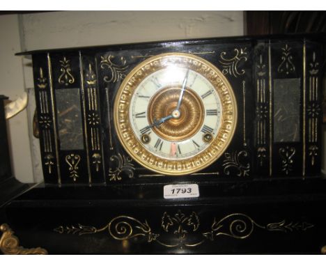 19th Century French black slate and gilt decorated mantel clock with rams head side handles, the gilt and enamel dial with Ro