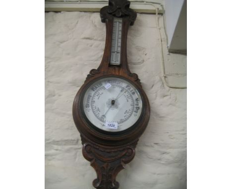 Late Victorian carved oak aneroid barometer / thermometer