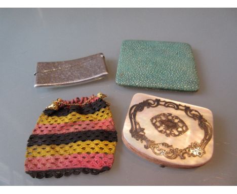 Mother of pearl silver mounted purse, fish skin cigatette case, gilt mounted coin pirse and a silver card case