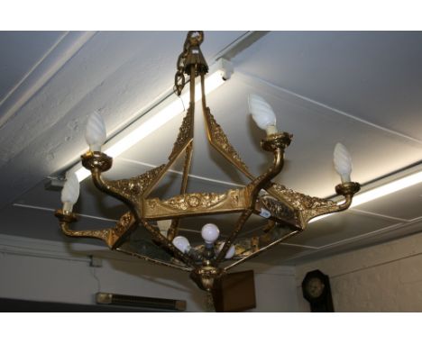 Art Deco ormolu and glass six light electrolier with relief floral decoration (two of the six glass panels lacking)