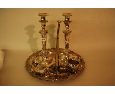 Pair of plated on copper candlesticks, circular plated tray, a post horn, ladle, candle snuffers and a jug