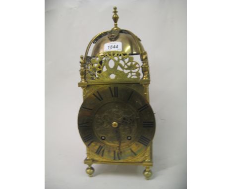 Late 19th / early 20th Century brass cased lantern clock with Roman numerals and two train movement striking on a bell